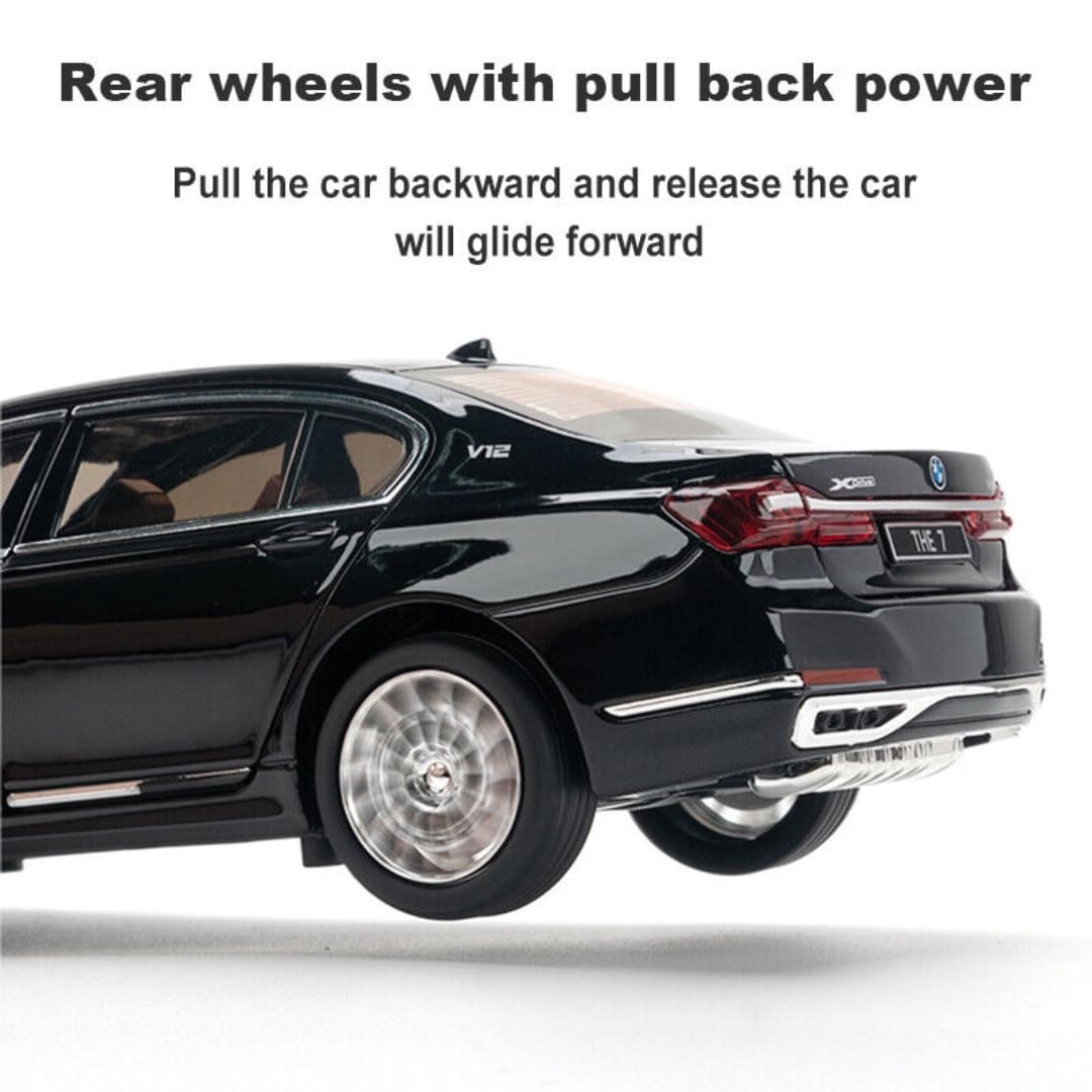 Black toy car with rear wheels designed for pull back power on a white background